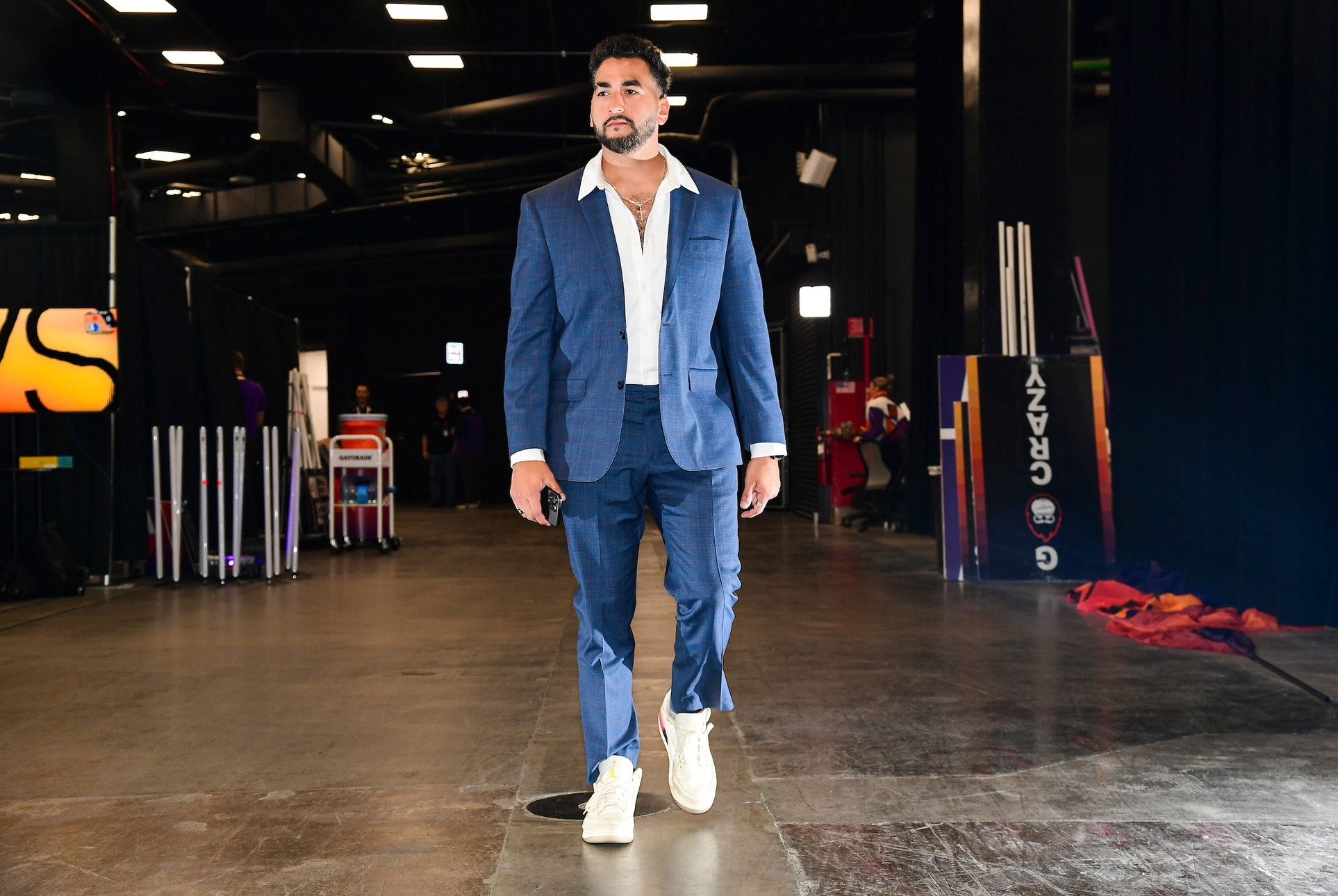 Trainer Luis walking towards the camera